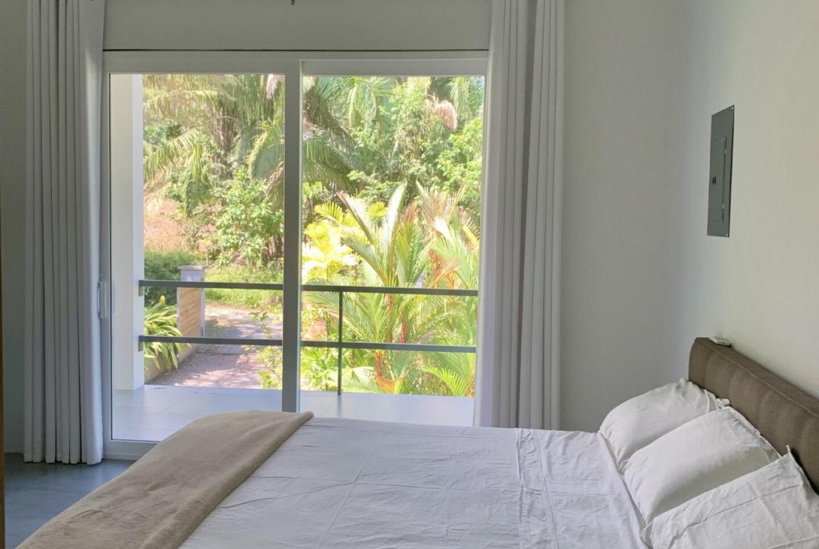 beautiful-pavones-home-with-large-lot-walking-distance-to-beach