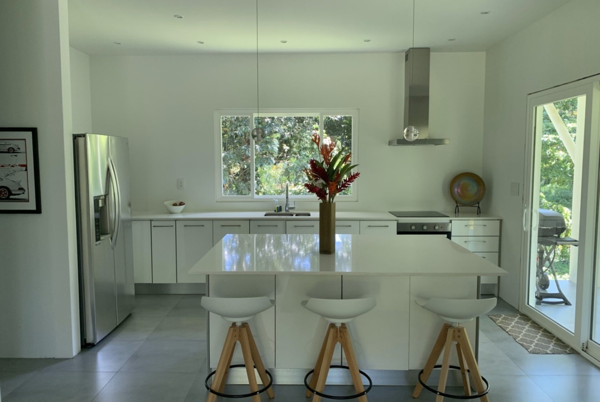 beautiful-pavones-home-with-large-lot-walking-distance-to-beach